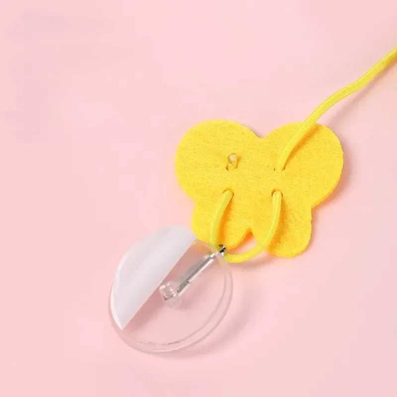 Jouet suspendu en peluche avec corde et clochette